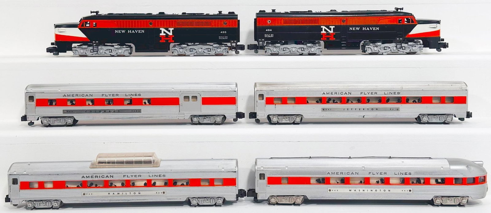 American Flyer Postwar S Gauge 494 and 495 New Haven Alco A - A Diesel Units/4 Assorted Aluminum: American Flyer Postwar S Gauge 494 and 495 New Haven Alco A - A Diesel Units and Four (4) Assorted Aluminum Passenger Cars with orange stripe through windows, with the 494 and 495, each in C7 plus, an