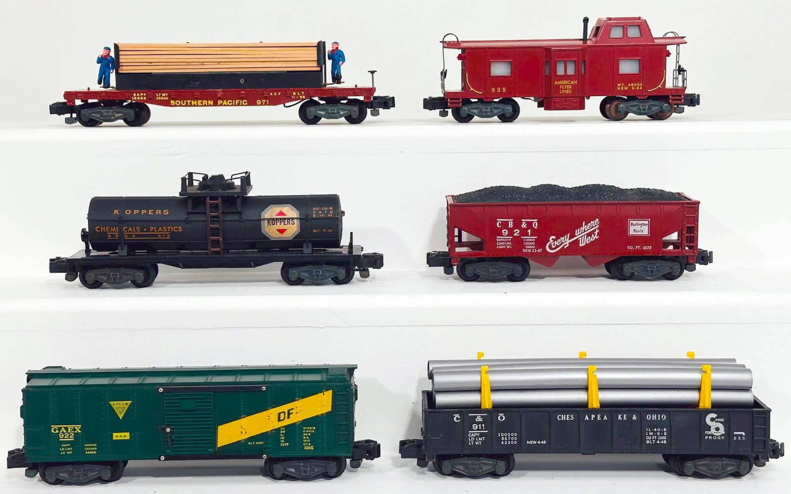American Flyer Postwar S Gauge Six (6) Assorted Freight Cars: American Flyer Postwar S Gauge Six (6) Assorted Freight Cars, including 922 - 935 - 921 - 912 - 971 - 911 with silver pipe load, each in C7 plus.