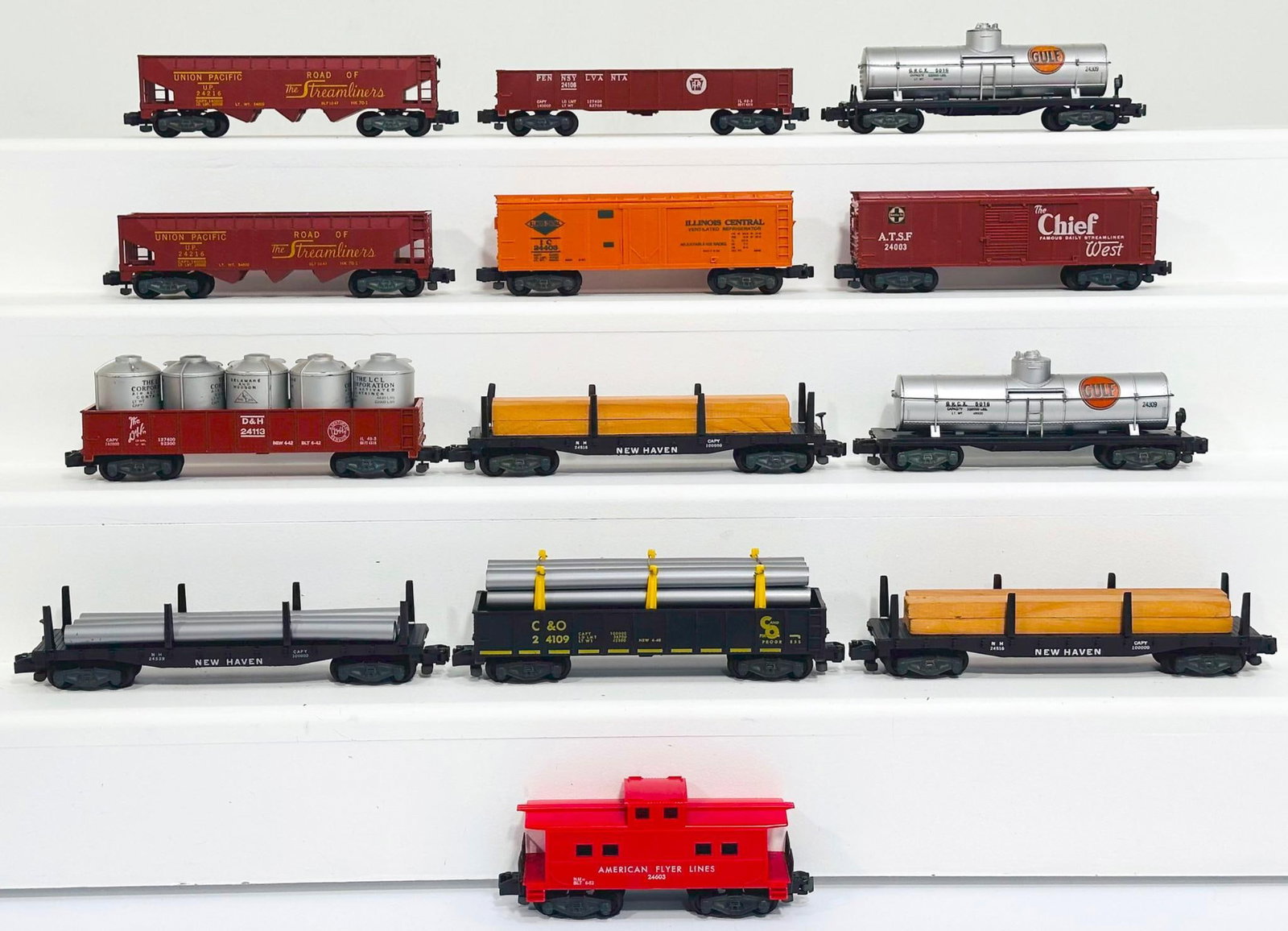 American Flyer Postwar S Gauge Thirteen (13) Assorted Freight Cars: American Flyer Postwar S Gauge Thirteen (13) Assorted Freight Cars, including 24216 in C7 plus, 24003 in C7 plus, 24309 in C7, 24603 in C7 plus, 24106 in C7 plus, 24216 in C7 plus, 24309 in C7 plus, 2