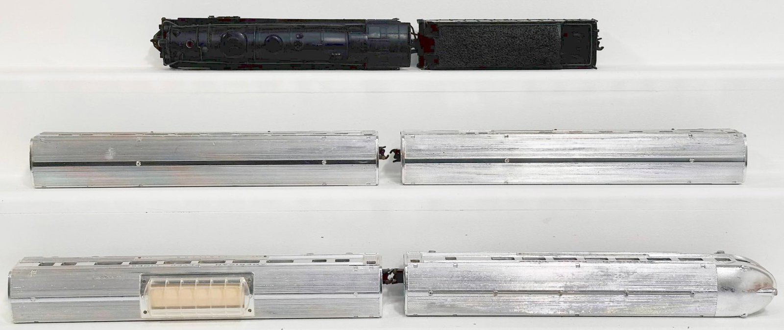 American Flyer Postwar S Gauge 326 Central 4 - 6 - 4 Locomotive and Tender and Four (4) Assorted: American Flyer Postwar S Gauge 326 Central 4 - 6 - 4 Locomotive and Tender and Four (4) Assorted Chrome Passenger Cars, with the 326 Locomotive and Tender each in C7 to C7 plus, and including 960, 963