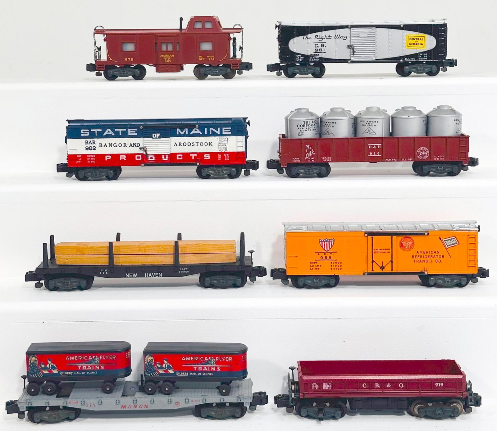 American Flyer Postwar S Gauge Eight (8) Assorted Freight Cars: American Flyer Postwar S Gauge Eight (8) Assorted Freight Cars, including 916 with five cannisters in C7 plus, 981 in C7 plus, 988 in C7 plus, 956 in C7 plus, 979 in C7 plus, 982 in C7 plus, 928 with 