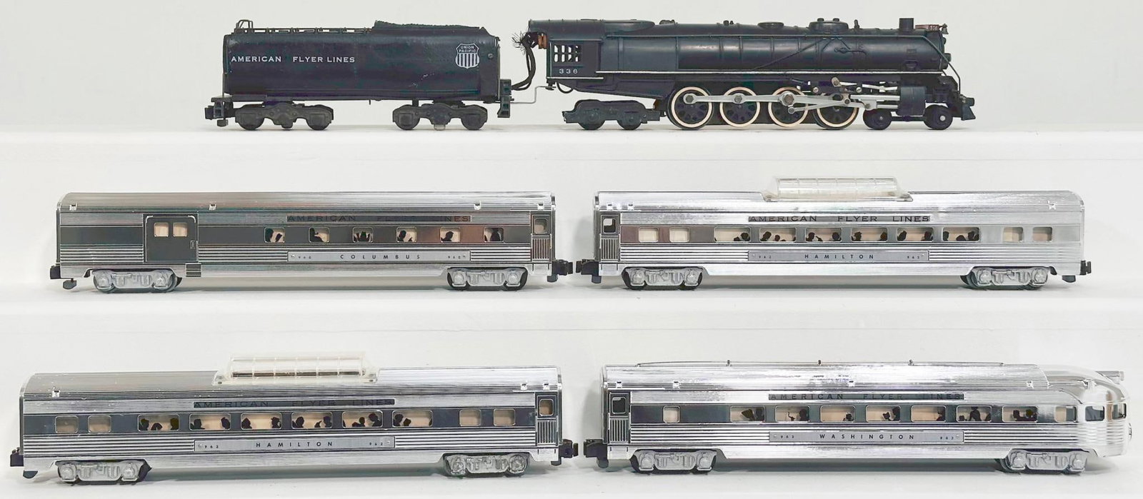 American Flyer Postwar S Gauge 336 Union Pacific 4 - 8 - 4 Locomotive and Tender and Four (4): American Flyer Postwar S Gauge 336 Union Pacific 4 - 8 - 4 Locomotive and Tender and Four (4) Assorted Chrome Passenger Cars, with the 336 in C7 plus each, and the 960, 962, 963 and 962, each in C7 pl