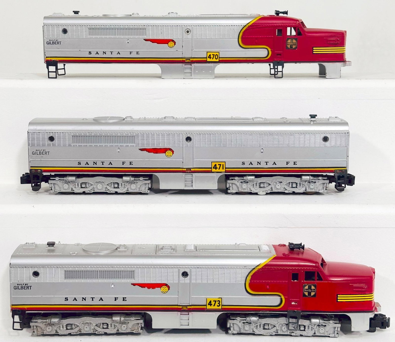 American Flyer Postwar S Gauge 470-471-473 Santa Fe Silver and Red Alco A-B-A Diesel Units: American Flyer Postwar S Gauge 470-471-473 Santa Fe Silver and Red Alco A-B-A Diesel Units, each in C7 plus, and shell only for the 470.
