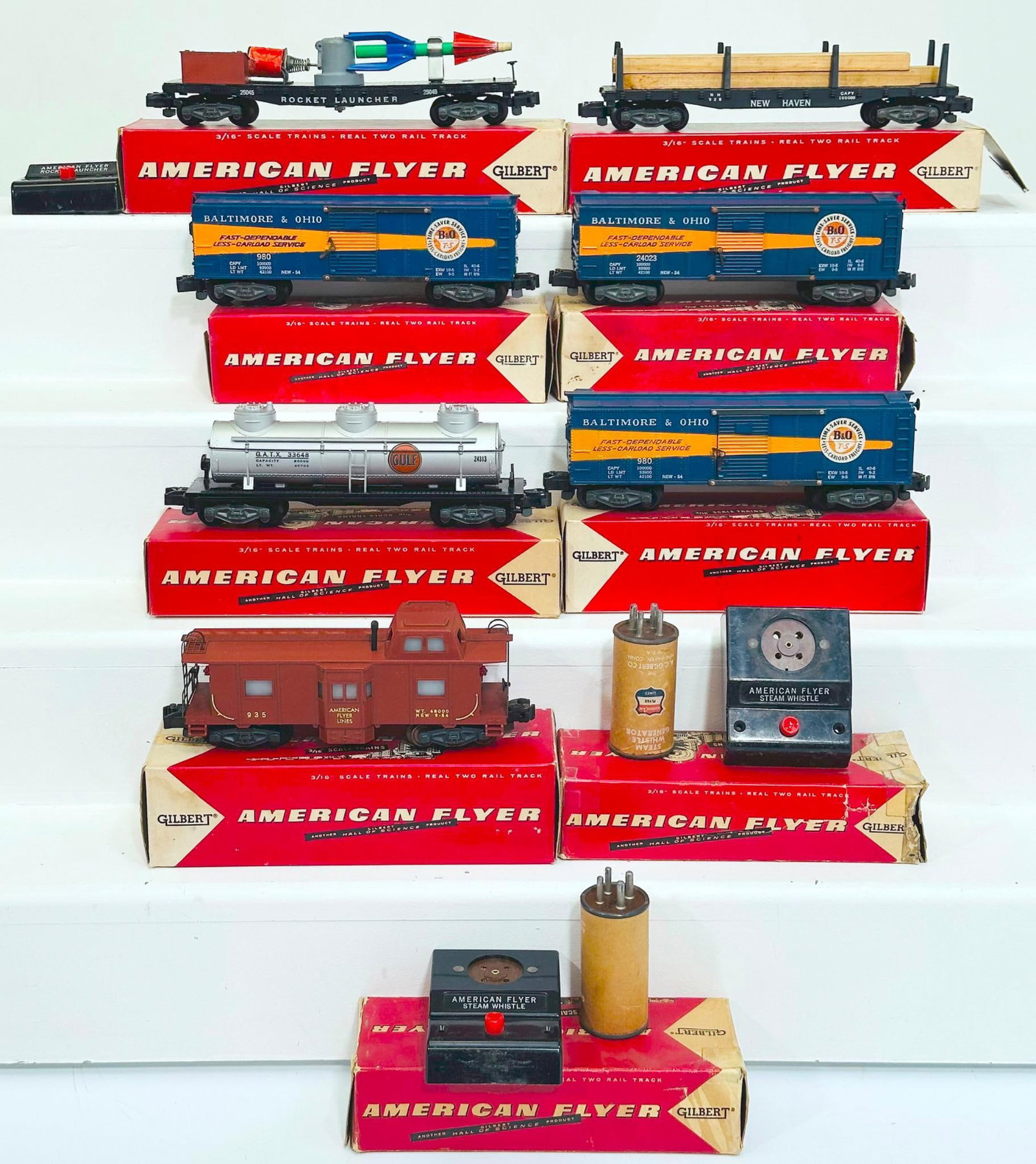 American Flyer Postwar S Gauge Seven (7) Assorted Freight Cars: American Flyer Postwar S Gauge Seven (7) Assorted Freight Cars, including 980 B&O Box Car in C7 plus and with its original box, 935 Caboose in C7 plus and with its original box, 980 B&O Box Car in C7 