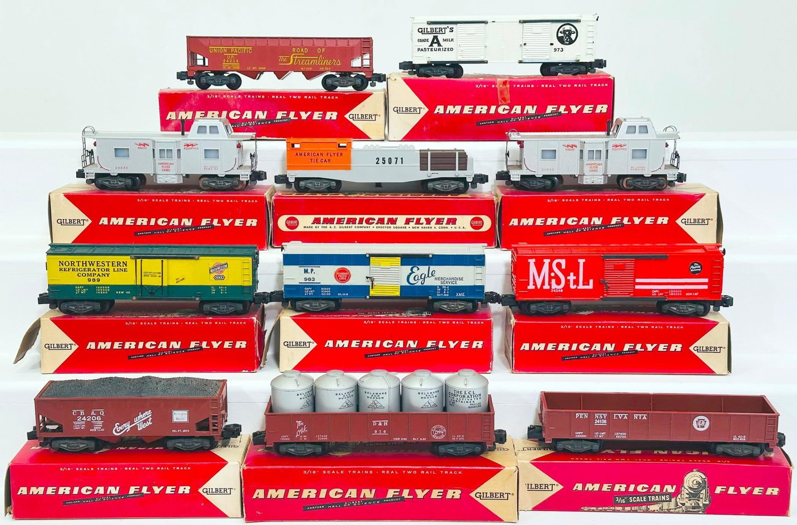 American Flyer Postwar S Gauge Eleven (11) Assorted Freight Cars Boxed: American Flyer Postwar S Gauge Eleven (11) Assorted Freight Cars Boxed, including 24048 in C7 plus and with its original box, 989 Northwestern Reefer in C7 plus and with its original box, 983 in C7 pl