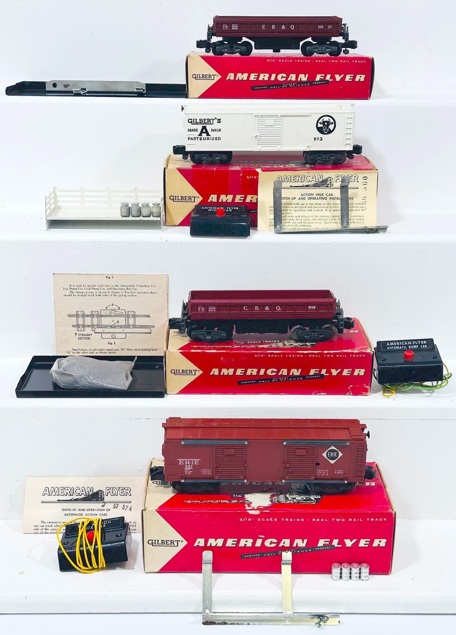 American Flyer Postwar S Gauge 973 Operating Milk Car - 25025 Operating Dump Car - 919 Operating: American Flyer Postwar S Gauge 973 Operating Milk Car - 25025 Operating Dump Car - 919 Operating Dump Car - 957 Action Box Car, each in C7 plus and each with its original box.