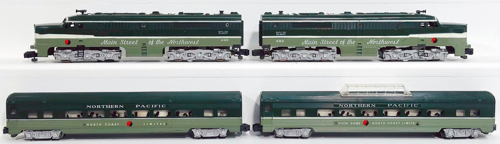 American Flyer Postwar S Gauge Northern Pacific 490 and 492 A-A Alco Diesel Units and 901/902: American Flyer Postwar S Gauge Northern Pacific 490 and 492 A-A Alco Diesel Units and 901/902 Northern Pacific Passenger Cars, each in C7 and some paint loss on the 490 front right frame.
