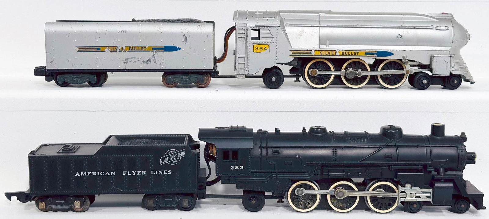 American Flyer Postwar S Gauge 354 Silver Bullet Locomotive and Tender and 282 Chicago Northwestern: American Flyer Postwar S Gauge 354 Silver Bullet Locomotive and Tender and 282 Chicago Northwestern 4-6-2 Locomotive and Tender, with the 282 in C7 plus or better and the 354 in C6.