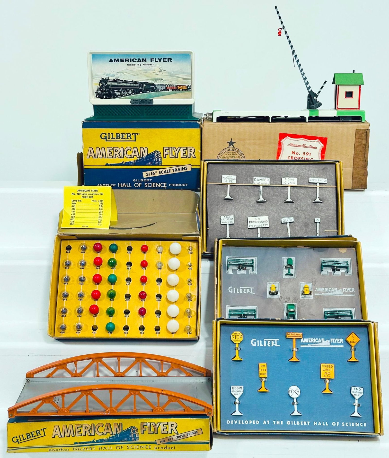 American Flyer Postwar S Gauge 591 Crossing Gate/568 Whistling Board: American Flyer Postwar S Gauge 591 Crossing Gate/568 Whistling Board/571 Truss Bridge / 30 Highway Signs/460 Lamp Assortment Kit, each in C7 plus and each with tis original box.