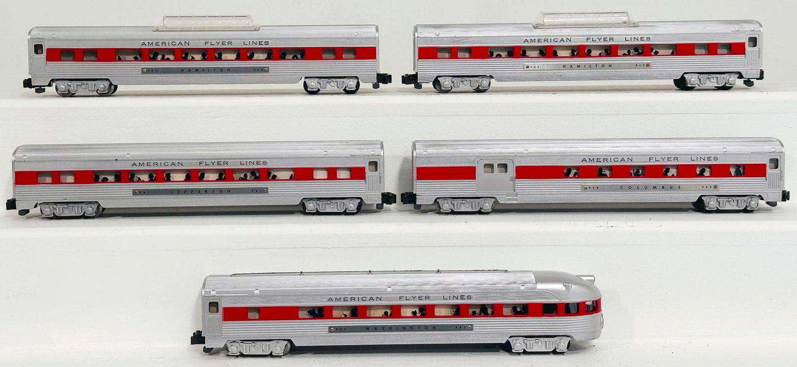 American Flyer Postwar S Gauge Five (5) Assorted Aluminum Passenger Cars with red stripes through: American Flyer Postwar S Gauge Five (5) Assorted Aluminum Passenger Cars with red stripes through windows, including 960, 961, 962, 962 and 963, each in C7 plus or better.