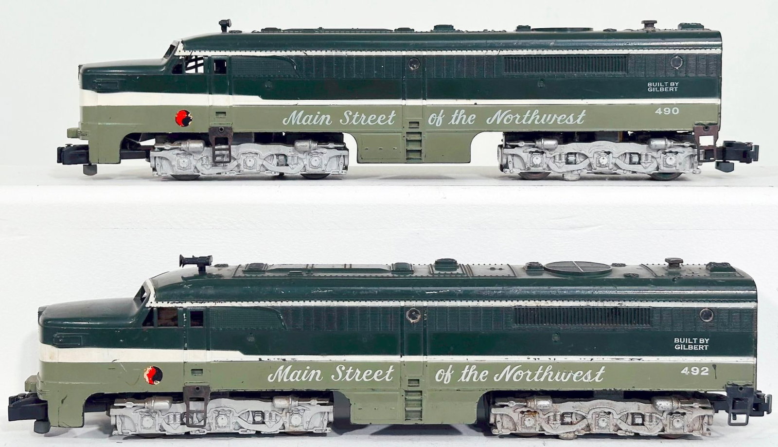American Flyer Postwar S Gauge 490 and 492 Northern Pacific A - A Alco Diesel Units: American Flyer Postwar S Gauge 490 and 492 Northern Pacific A - A Alco Diesel Units, with the 490 in C7 and missing its horn and the 492 in C6 to C7 minus.