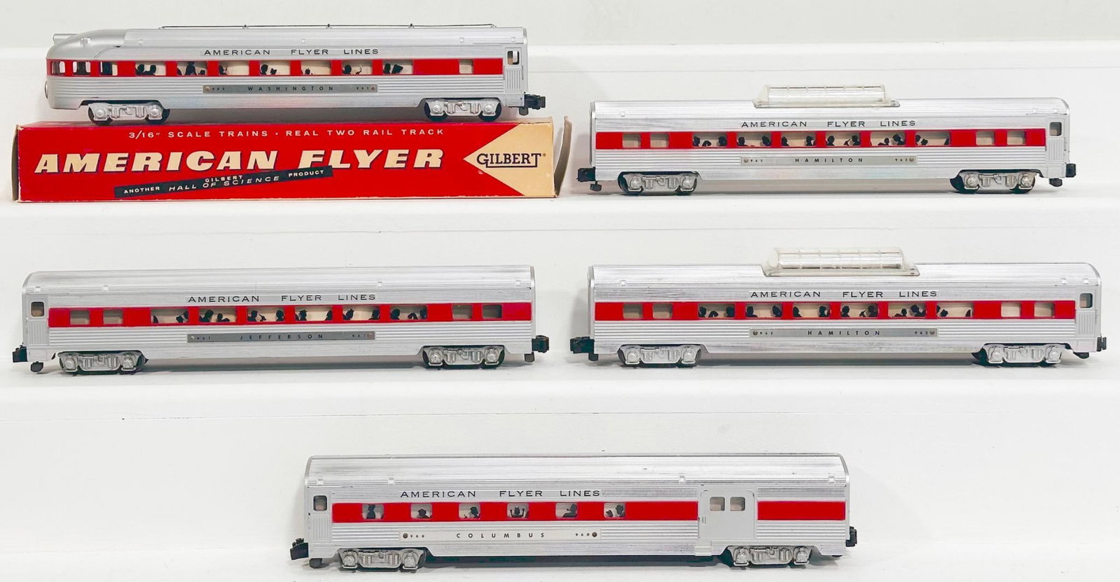 American Flyer Postwar S Gauge 960 - 961- 962 - 963 Aluminum Passenger Cars with red stripe through: American Flyer Postwar S Gauge 960 - 961- 962 - 963 Aluminum Passenger Cars with red stripe through windows, each in C7 to C7 plus. This Lot also includes original box for the 963, with one end flap d
