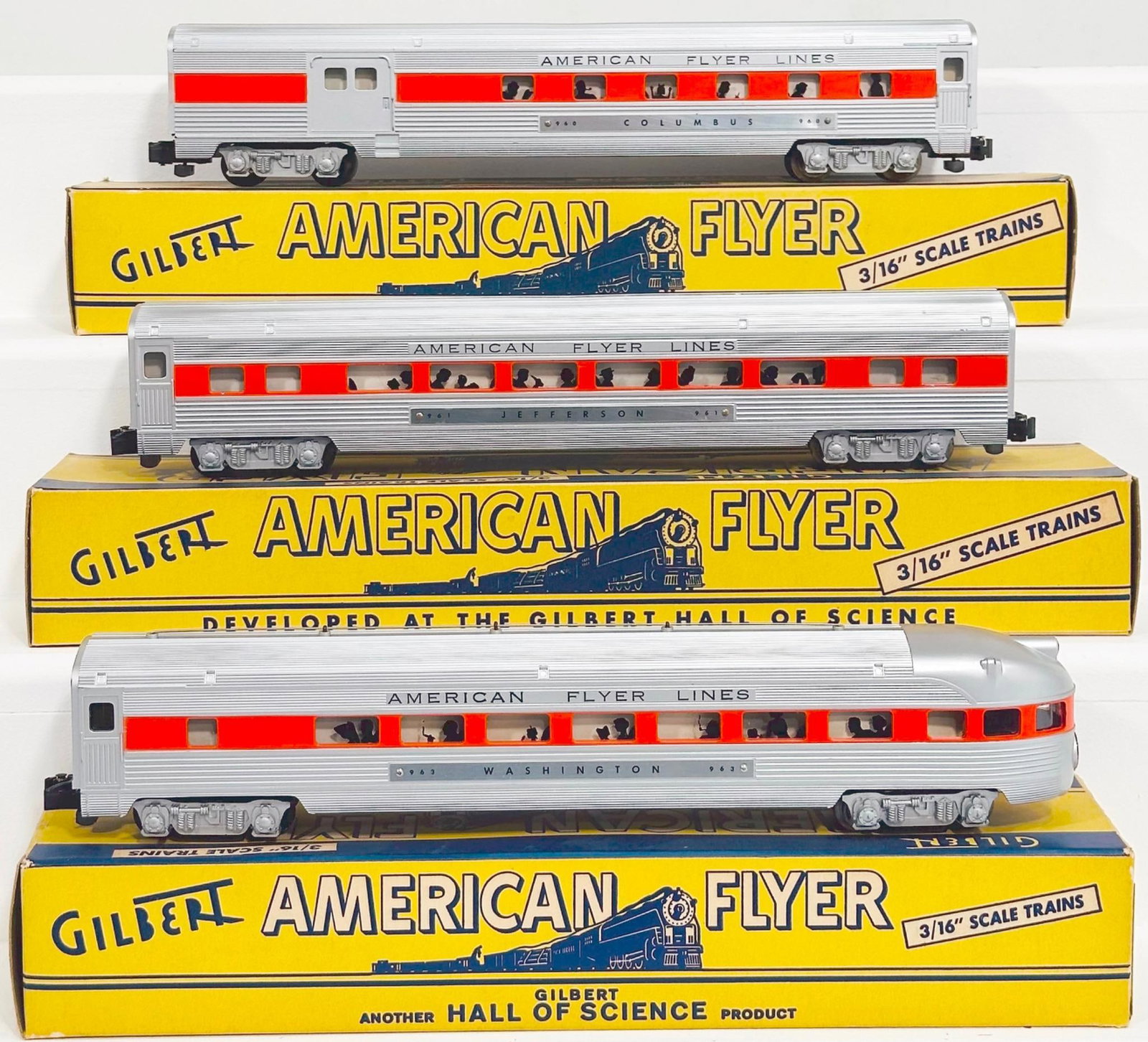 American Flyer Postwar S Gauge 960 - 961 - 963 Aluminum Passenger Cars with orange stripe through: American Flyer Postwar S Gauge 960 - 961 - 963 Aluminum Passenger Cars with orange stripe through the windows, each in C7 plus and each with its original box.