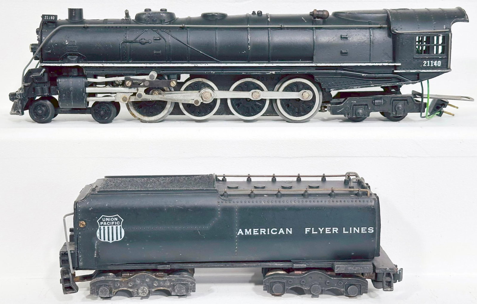 American Flyer Postwar S Gauge 21140 Union Pacific 4 - 8 - 4 Locomotive and Tender: American Flyer Postwar S Gauge 21140 Union Pacific 4 - 8 - 4 Locomotive and Tender, in C7 minus because one of the front runner boards is detached and missing.