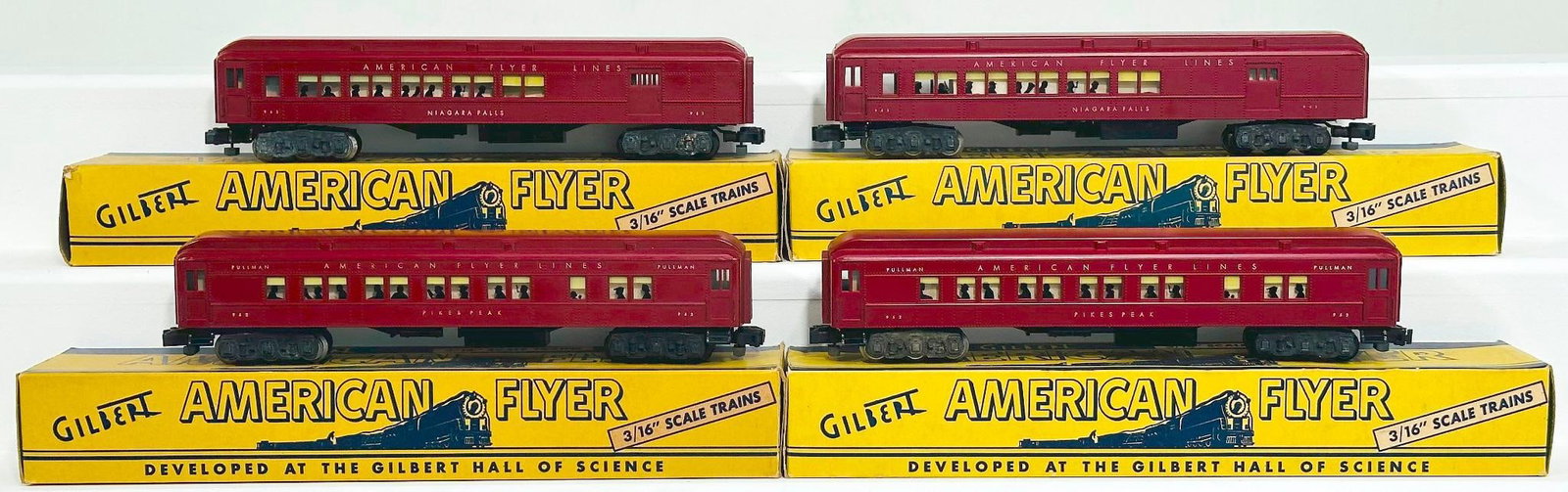American Flyer Postwar S Gauge 952 - 953 - 953 - 952 red Madison Passenger Cars with silhouettes in: American Flyer Postwar S Gauge 952 - 953 - 953 - 952 red Madison Passenger Cars with silhouettes in the windows, each in C7 to C7 plus and each with its original box.