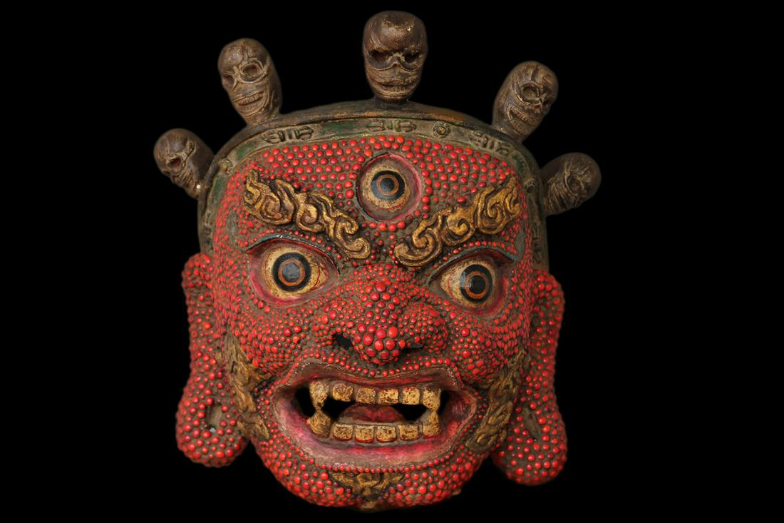 Antique Glass Beaded Mahakala Papier-MÃ¢chÃ© Mask: A Glass Beaded Mahakala Papier-MÃ¢chÃ© Mask for Dance Bhutan, circa 20th century 39.5 x 34.5 cm Ceremonial mask, with coral glass bead stones and consecrated Tibetan letters OM HA HUM Mantra. At t