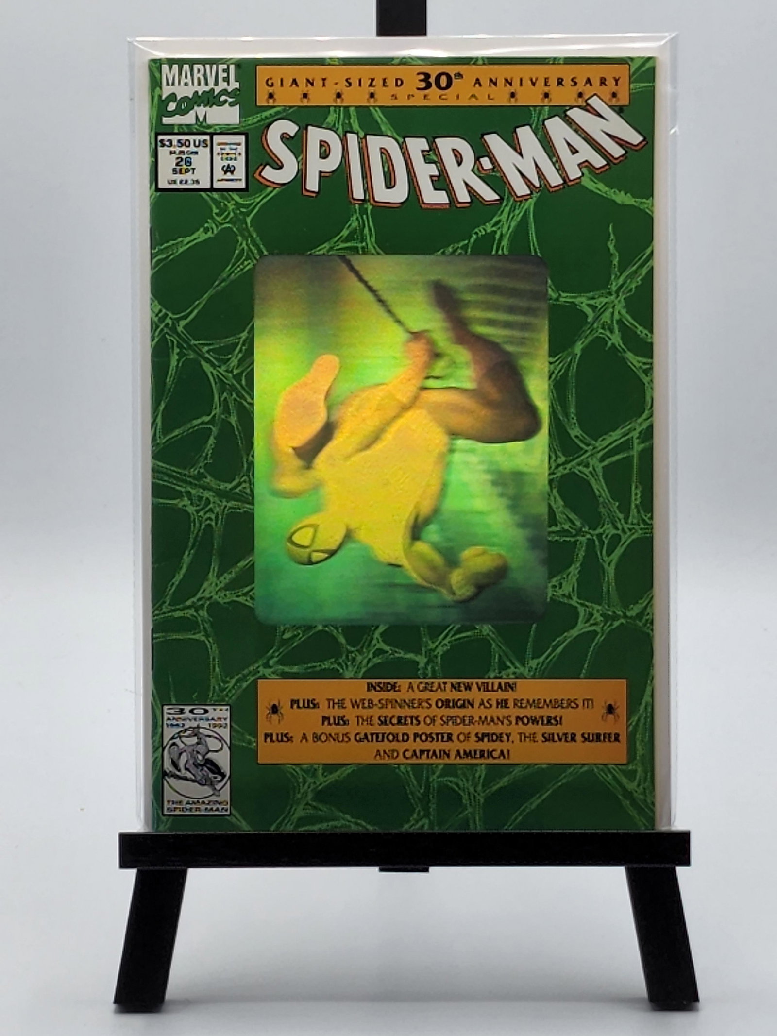 Spider-Man #26 (30th Anniversary Special): Spider-Man #26 (30th Anniversary Special) with Hologram Cover, "With Great Responsibility -- !" (Marvel, 1992). Bagged and boarded. Shipped in a protected Gemini Comic Flash Mailer via USPS Priority M