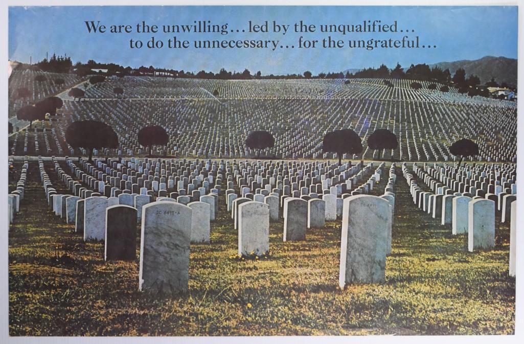 1970 We Are The Unwilling Political Poster: Presenting a rare headshop, political poster from 1970 with a powerful message exhibited by a color image of a military cemetery of thousands of grave stones. The We Are Unwilling quote at the top con