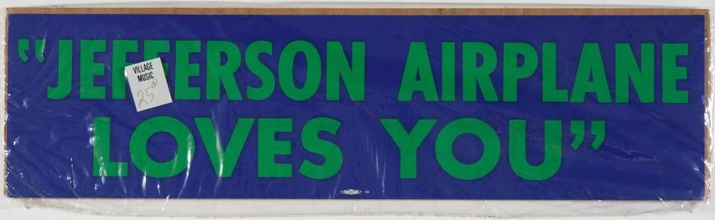 1977 Jefferson Airplane Loves You Sealed In Packaging From Village Music Bumper Sticker Mint 91: This is an original promotional bumper sticker reading "Jefferson Airplane Loves You" from 1977. It remains in the SEALED original packaging from Village Music! Condition Details: Still in
