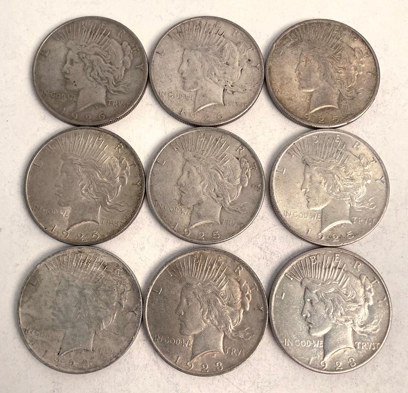 A Group of 9 Silver Peace Dollar Coins (1 of 2)