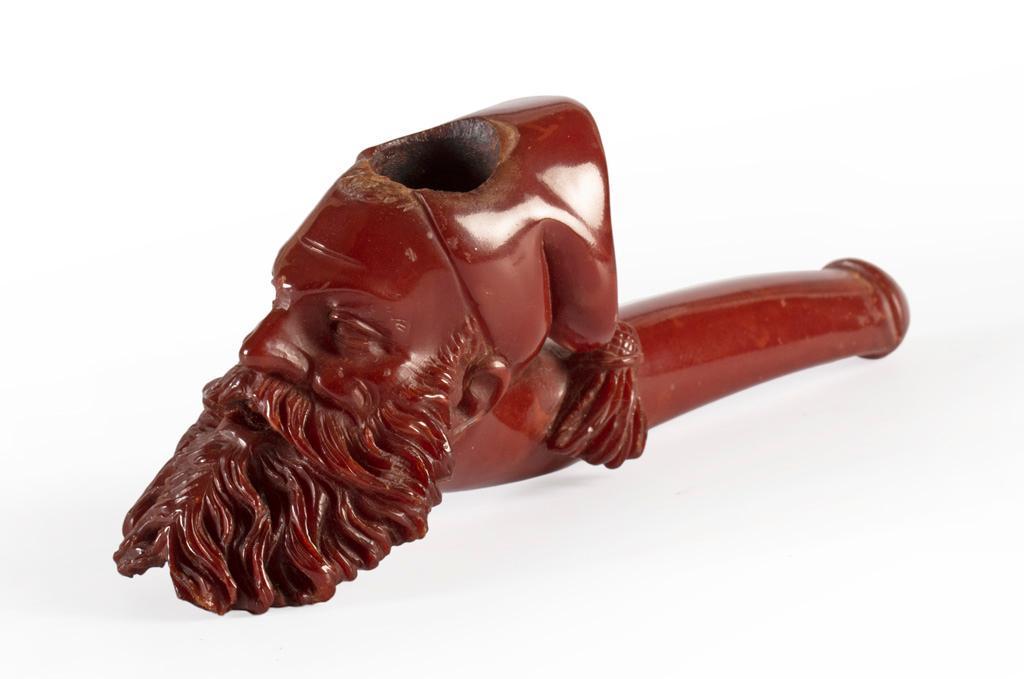 An Amber Carved Figural Pipe of Bearded Man in Turkish Hat (1 of 3)