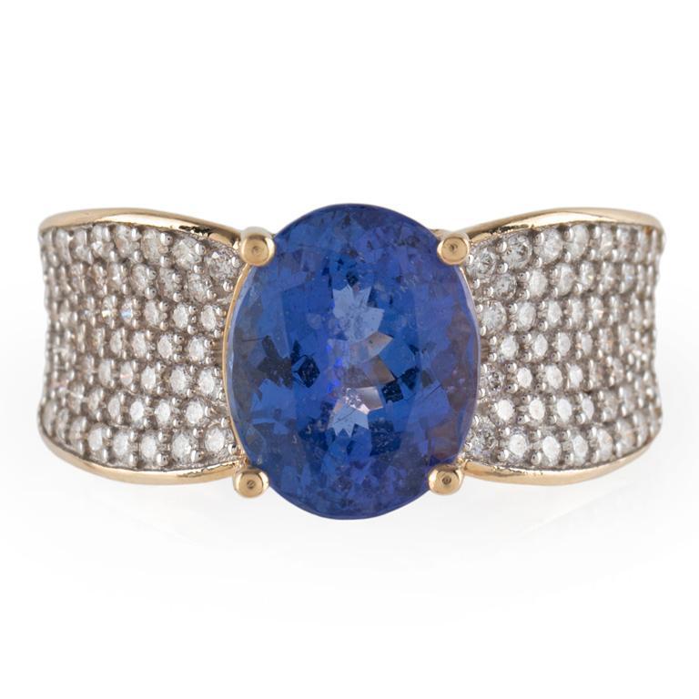 14K Tanzanite and Diamond Ring: 14K tanzanite and diamond ring weight: 4.8 grams size: 6