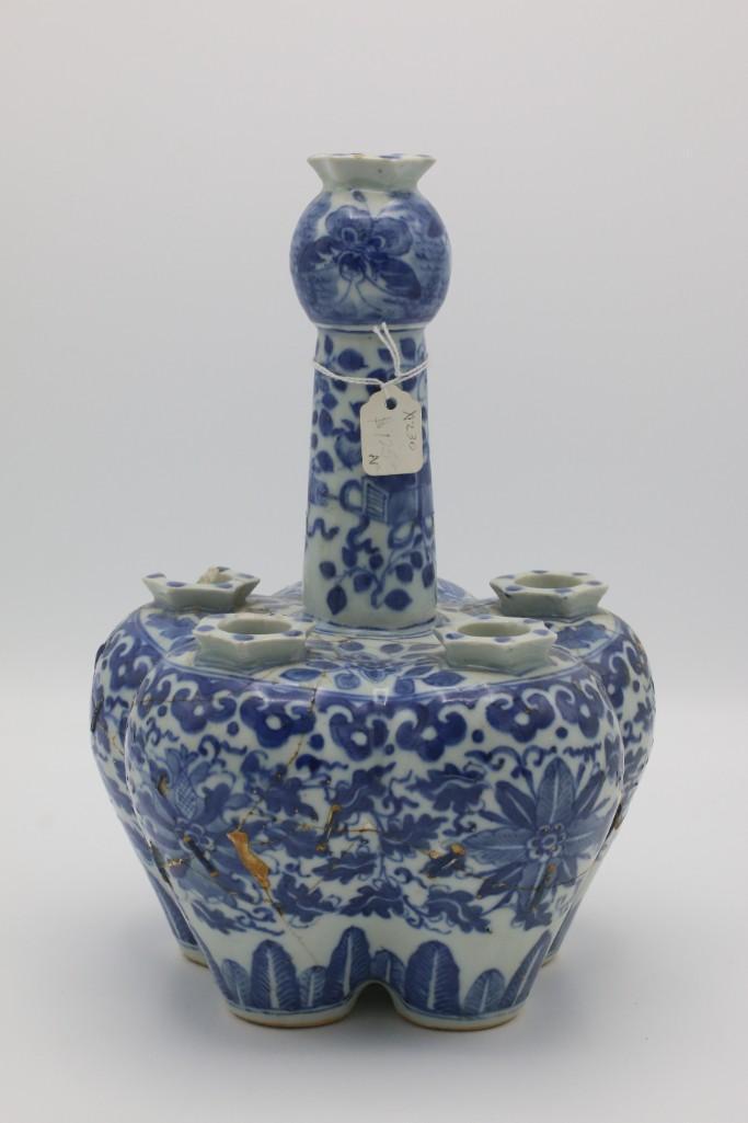 A 19thc. Chinese Porcelain Tulpenvaas: Chinese, 19th century. Ogee shaped porcelain tulpenvaas with five-lower floral inserts and stem/turret shaped top opening for long stem flowers. Painted with foliage and botanical motif. ht. 10.75, wd