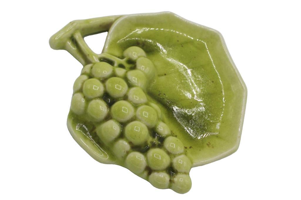 A Rookwood Pottery Grape Dresser Dish: American (Cincinnati, Ohio), 20th century. A Rookwood Pottery grape trinket dish. Marked XLVI/6391 underside. Overall good condition. 6 x 7 inches.