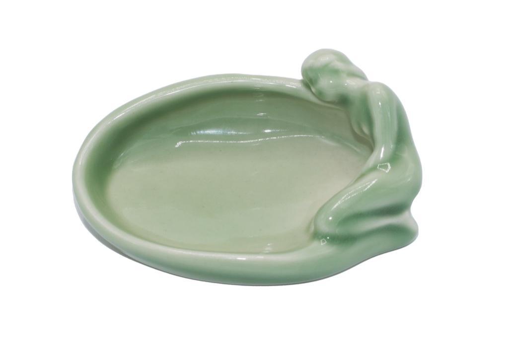 Rookwood Nude Figural Pin Tray, Anna Valentien: American, 20th century (1952). Rookwood nude figural pin tray design by Anna Valentien with milky, green glaze. Marked LII/2595 underside and dates to 1952. Overall good condition.