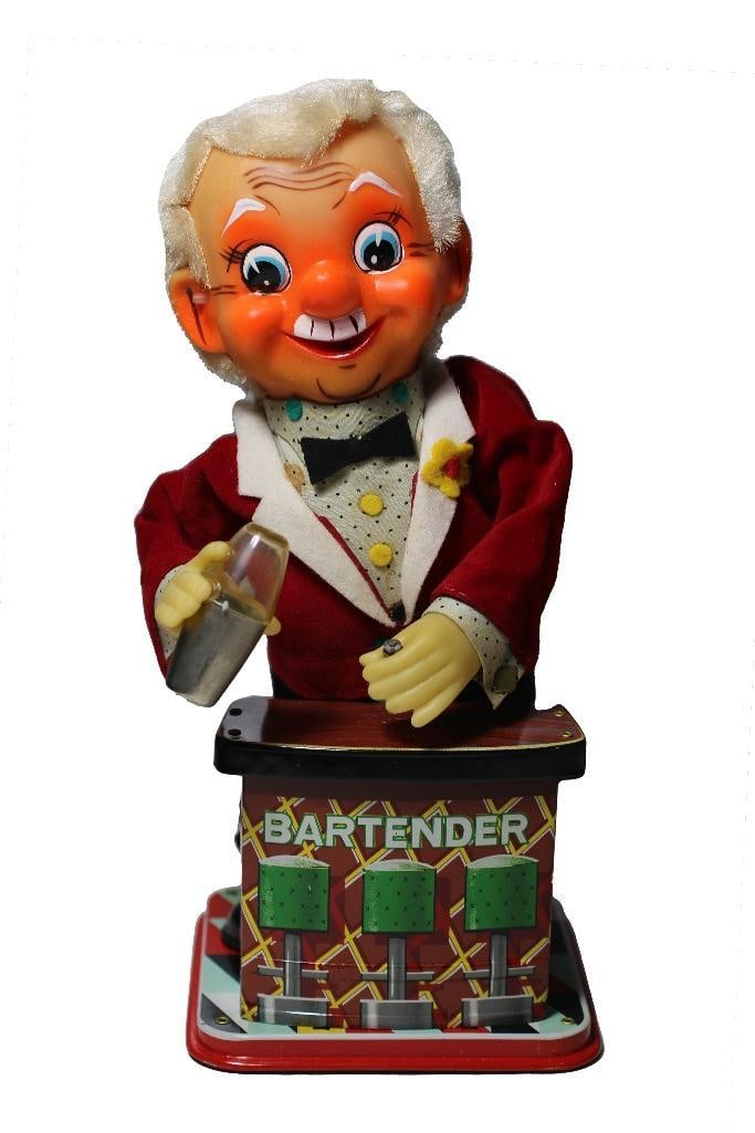 America, 1950's. A battery operated mechanical bartending toy, not tested. Cocktail glass broken in: America, 1950's. A battery operated mechanical bartending toy, not tested. Cocktail glass broken in left hand.
