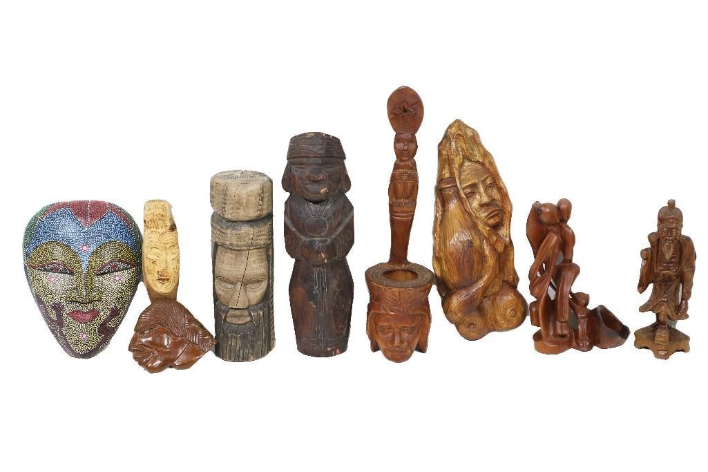 A lot of 9 wood-carved figurines from throughout the 20th century including a figural Polynesian: A lot of 9 wood-carved figurines from throughout the 20th century including a figural Polynesian ladle from the 1960s, an elder fisherman from Japan, a Jamaican totem-like bearded man, and an abstract