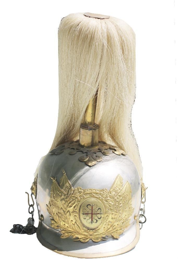 An antique Spanish lancer helmet with horse hair tassel; overall good condition. (1 of 5)