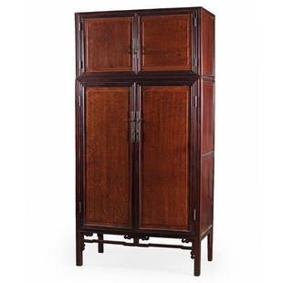 A Chinese Qing Dynasty Compound Cupboard: Chinese, late 18th or early 19th century. A two piece Chinese Qing dynasty compound cupboard in burlwood, upper cabinet with two paneled doors and single shelf interior, case with paneled sides, panel