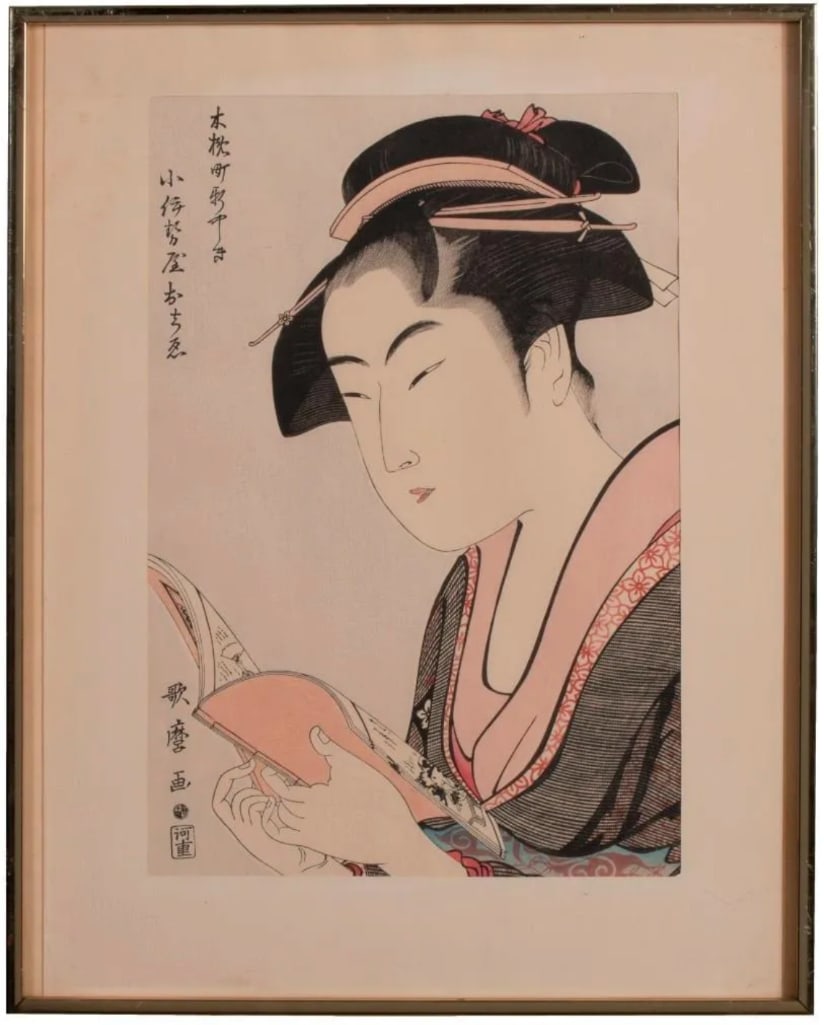 A 19th Century Japanese Woodblock by Kitagawa Utamaro: Kobikicho Arayashiki Koiseya Ochie watanabe published woodblock print signed l.l. 14 x 9.25 inches. (sight) 18.25 x 14.25 inches (frame) Provenance: Property from the estate collection of John D. Scho