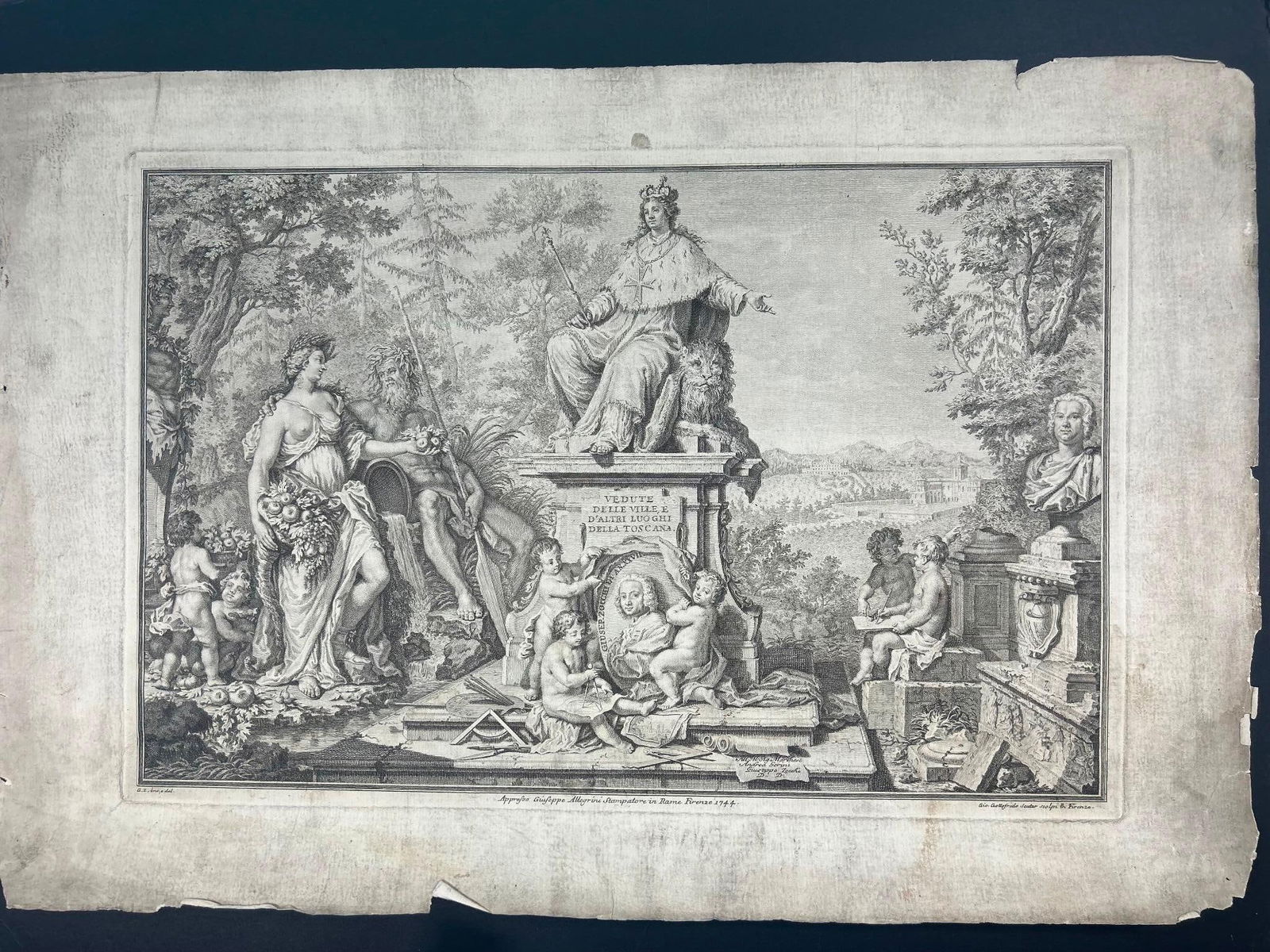 18th Century Giuseppe Zocchi Folio Page from Tuscany Pictorial Record: A print made by Johann Gottfried Seuter after Giuseppe Zocchi that was published by Giuseppe Bouchard. The etching features Maria Theresa on a pedestal, a carved plaque with the bust of Zocchi, flank