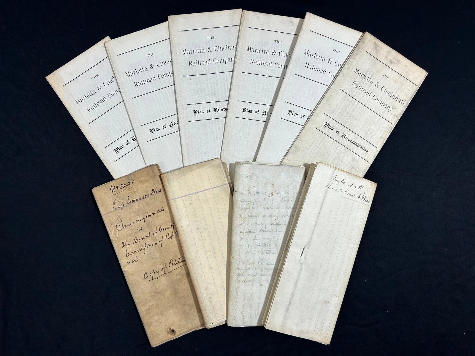 Marietta & Cincinnati Railroad Company 'Plan of Reorganization' Pamphlets and Deeds: America, 19th century. A lot of Marietta & Cincinnati Railroad Company pamphlets concerning their plan of reorganization. Also includes various land deeds. 432