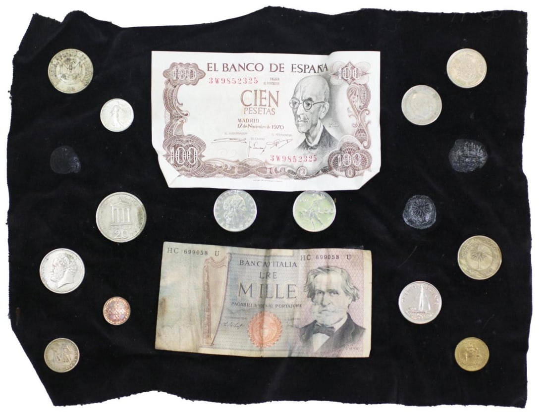 A Collection of International Coins and Paper Money -- Haiti, Greece, Bahrain, Hong Kong: Various International Coins and Paper Money: Includes Mexico, Jamaica, Canada, Israel, Canada, Austria, Hong Kong, Spain, Italy, Greece, Bahrain, Portugal, Haiti, among others. Mostly dating to the 19