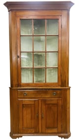 A 19th Century Neoclassical Style Cherry Corner Cupboard