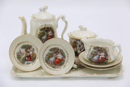 A German Made Tea Set with Draped Women