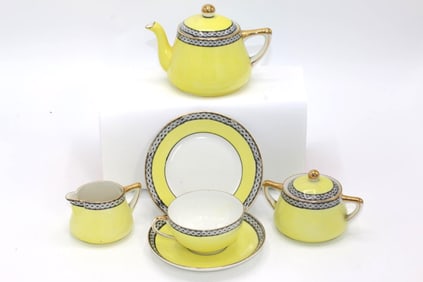 A Yellow Noritake Child's Tea Set