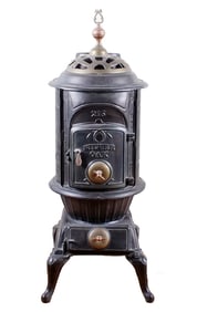 An Antique Wrought Iron Parlour Stove