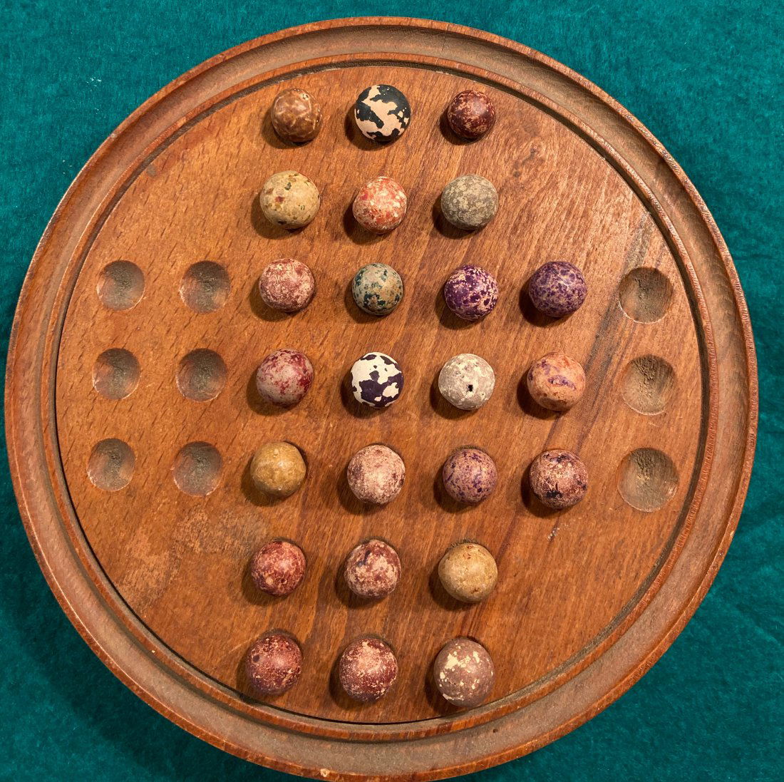 Collection of Clay Marbles - 24 Clay: Appear to be Clay marblesBoard not included