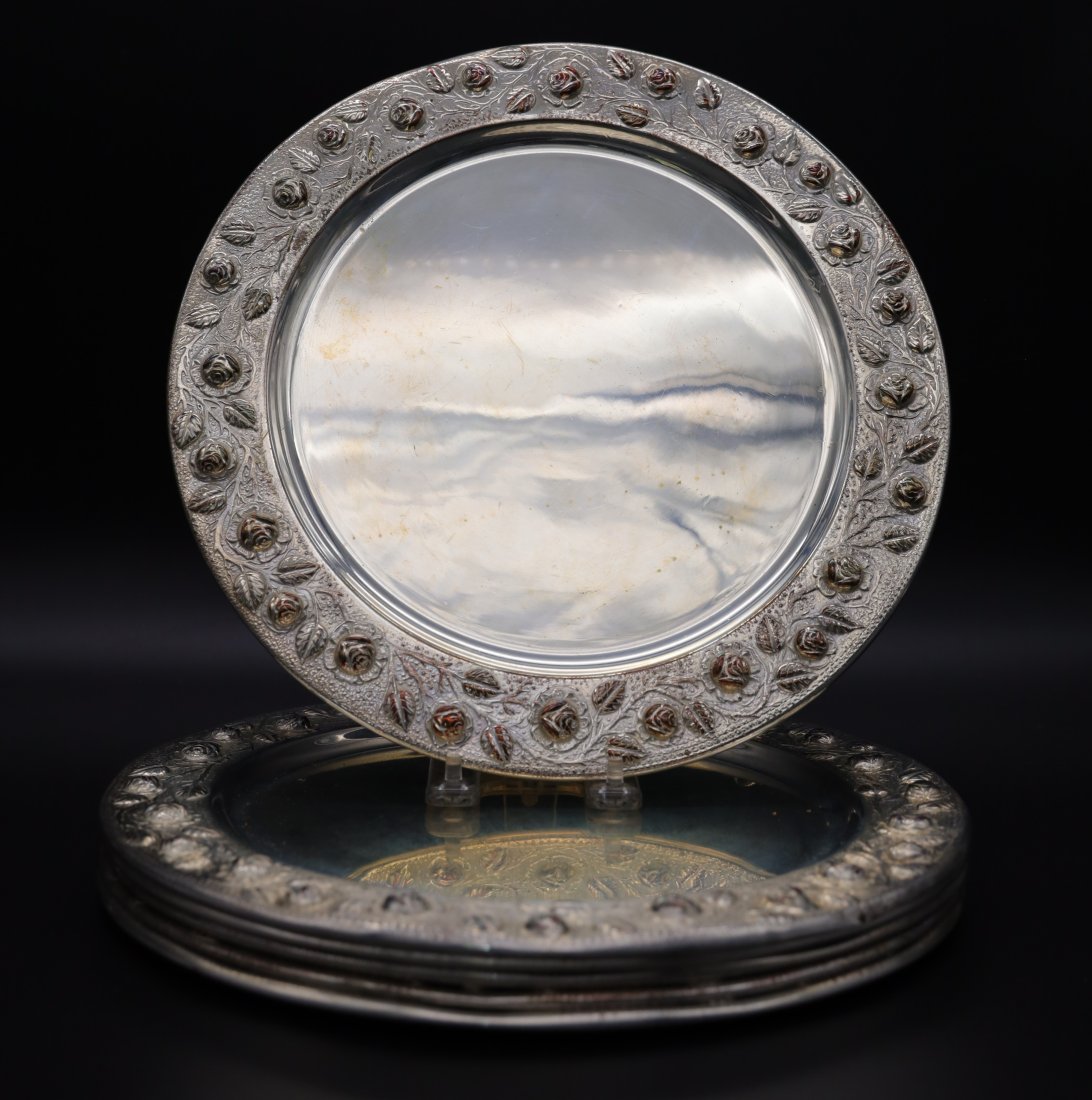 6 vintage chargers with Roses: 6 silver plate metal under plates with roses and leaves. Nice Quality