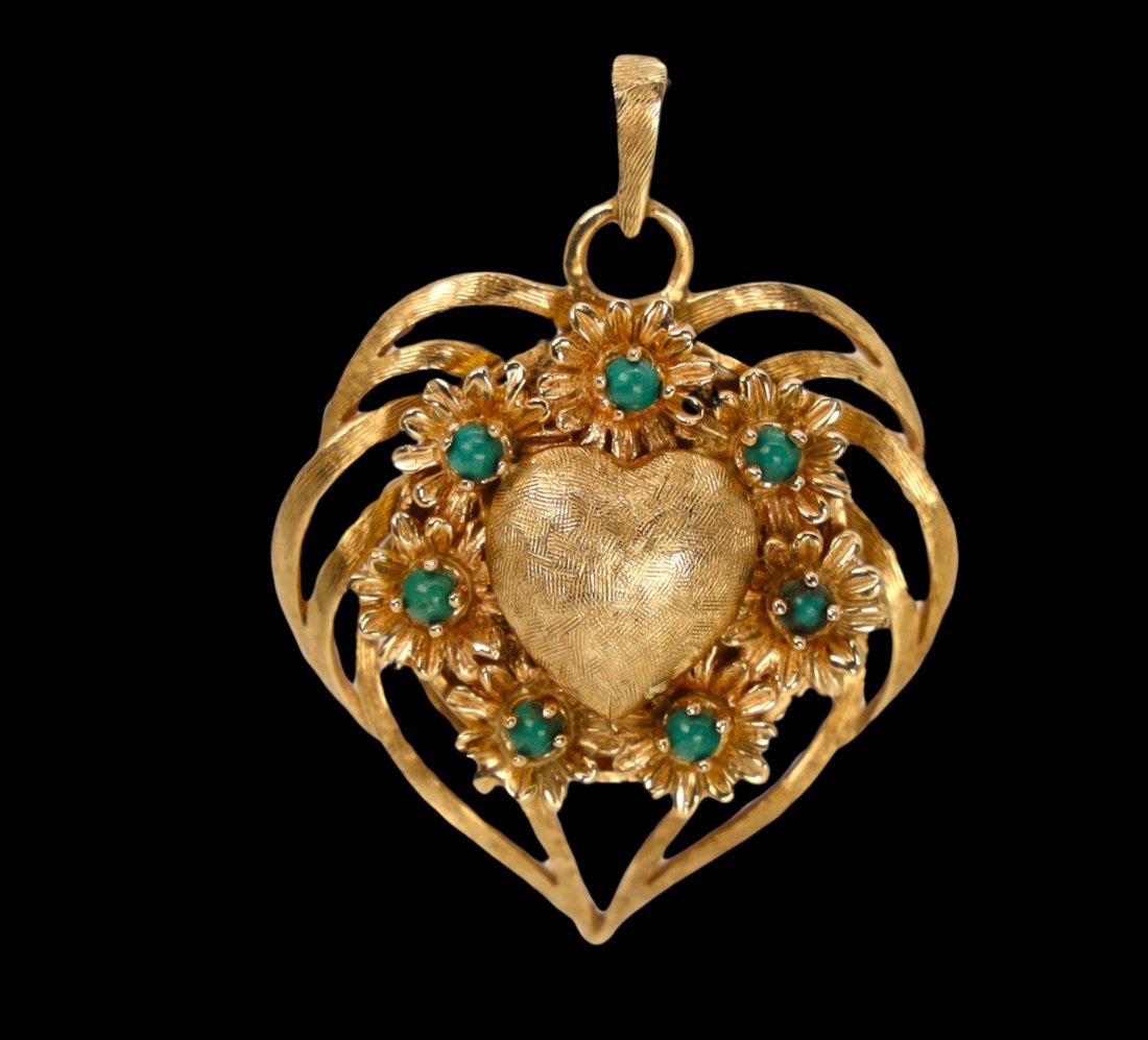 Vintage 14K Yellow Gold Heart Shape Pendant with a Watch: Nice Heart shaped pendant with working wind-up watch -7 Flowers with green stone surround the center heart. Very substantial17. GramsTW