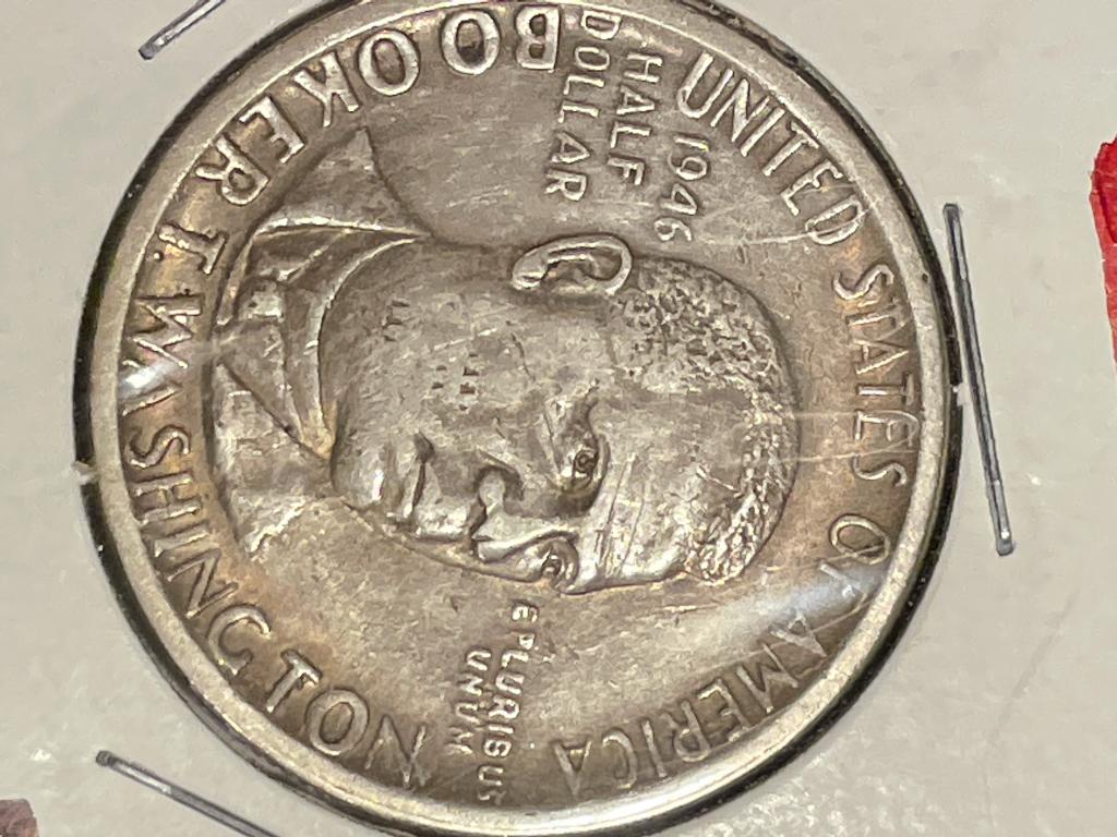 1946 BOOKER T. WASHINGTON HALF DOLLAR We are not: We are not experts, but in our opinion this coin is in almost uncirculated condition. Shipping will be $18.00 plus insurance and we will combine shipping.Feminine Touch Auctioneers does not guarantee