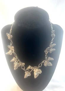 ELSA SCHIAPARELLI VINTAGE DESIGNER NECKLACE: 16" LONG, faux silver in a leaf pattern, signed excellent condition, circa 1960's