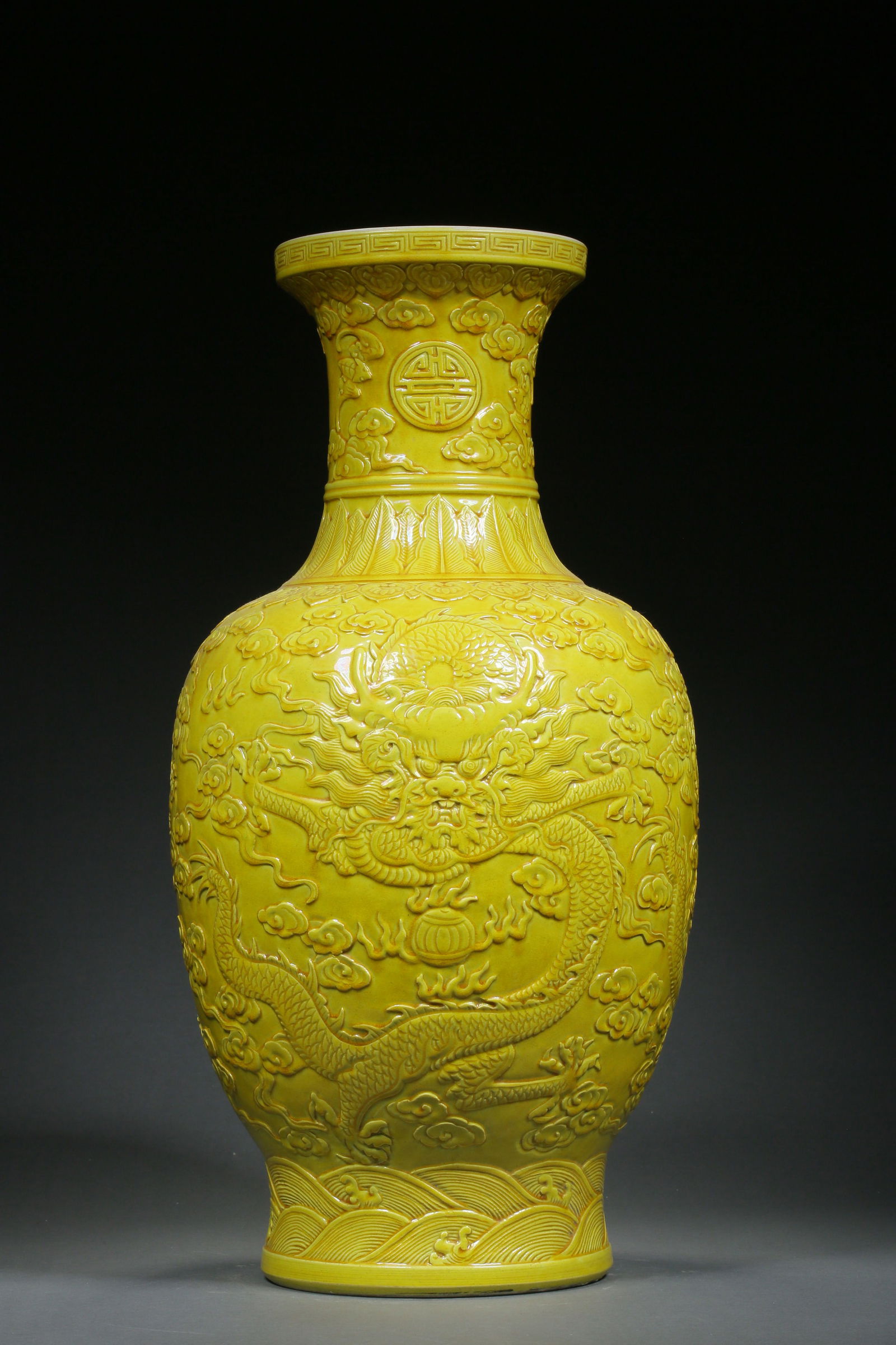 Imperial-Yellow Glazed Baluster Vase with Low-Relief Carved Dragon Motifs and Dish-Shaped Mouth: H:55cm