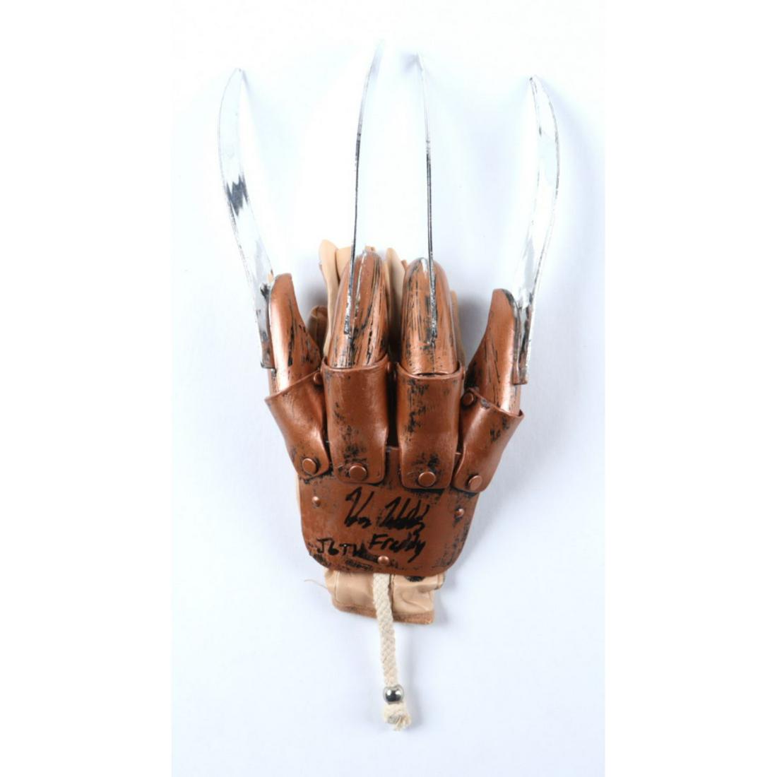 Kane Hodder Signed "A Nightmare on Elm Street" Freddy Krueger Glove Inscribed "Freddy" & "JGTH": "A Nightmare on Elm Street" Freddy Krueger replica glove. Hand-signed and inscribed by Kane Hodder. The lot / autograph(s) includes an official Beckett Authentication Services serially-numbered hologr