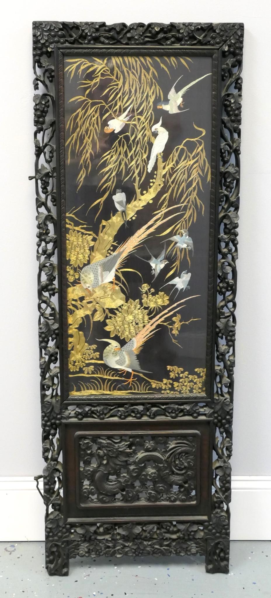 Avian and Arboreal Embroidery in Divider Panel: Divider panel featuring intricate avian and arboreal embroidery, with dense gold-tone needlework trees and leaves as a framework for displaying several embroidered birds such as a parrot, a cockatoo, 