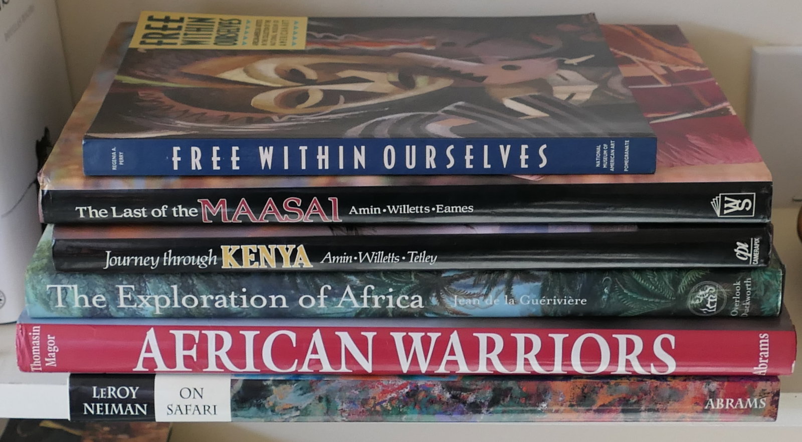 African Anthropology and Art Books: African anthropology and art books includes "Leroy Neiman on Safari" (artist of many Derby designs), "Journey Thru Kenya", "The Last of the Masai" and more, (6) total. Location: Sunroom